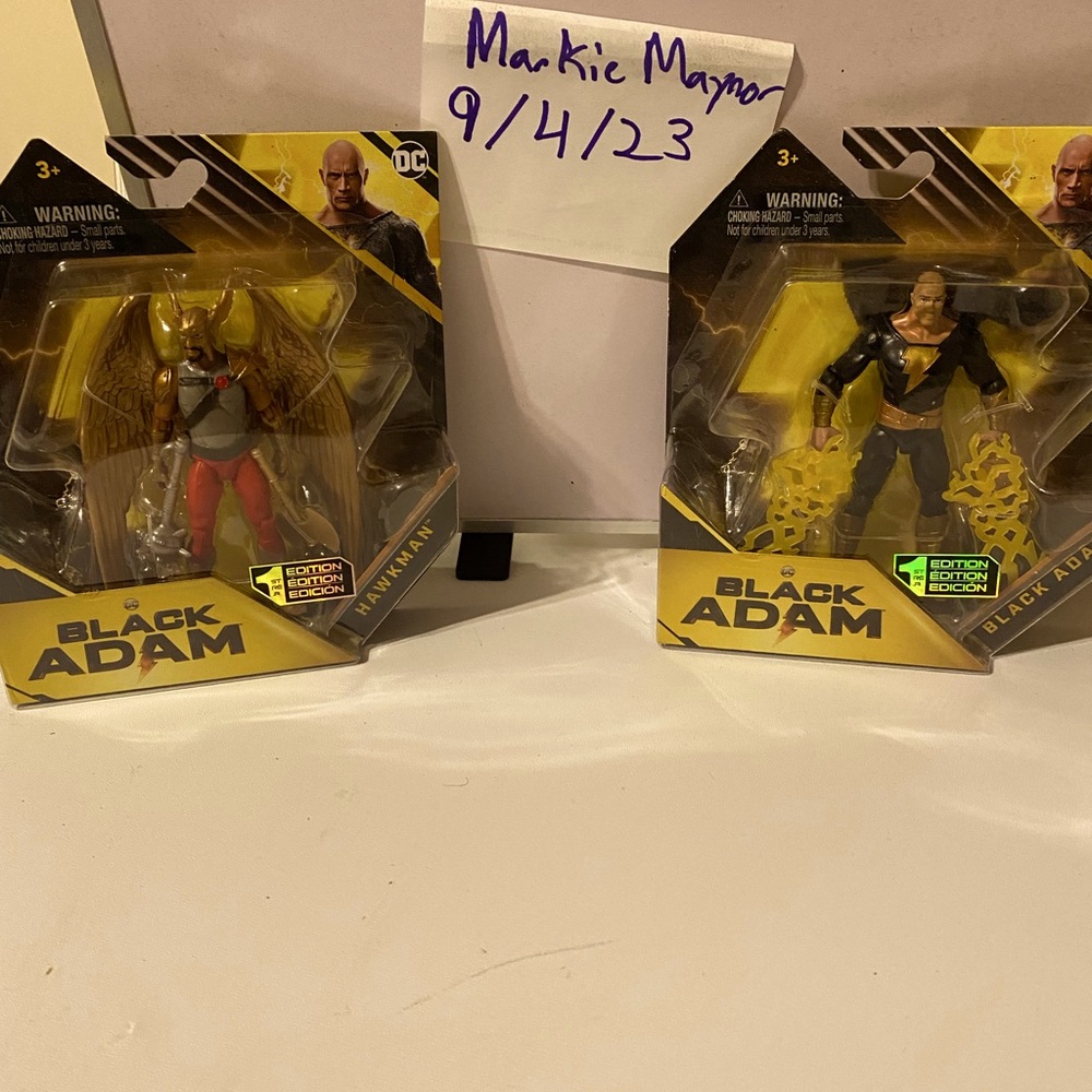 Two first edition Black Atom unopened figures.